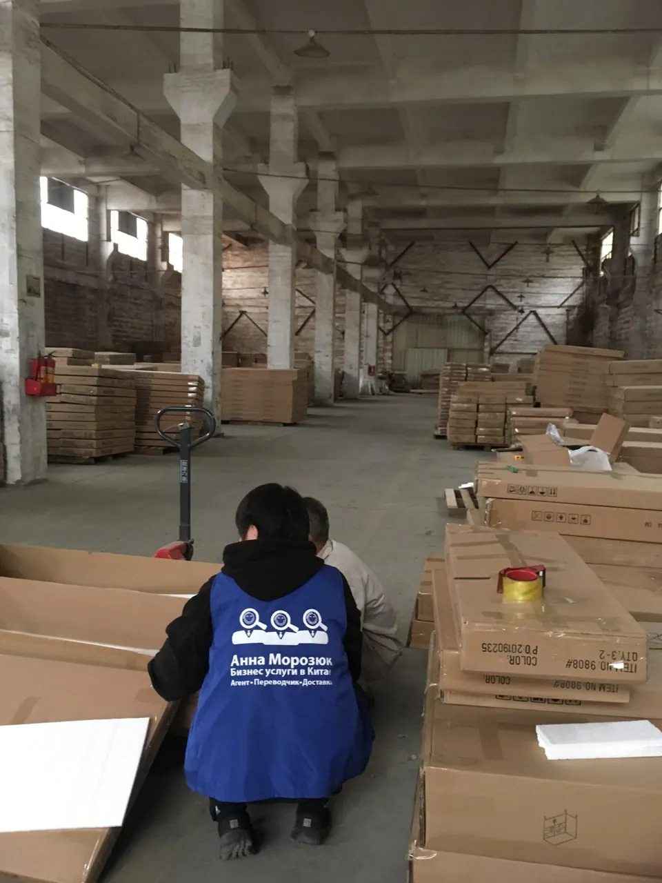 Checking stock on the warehouse floor
