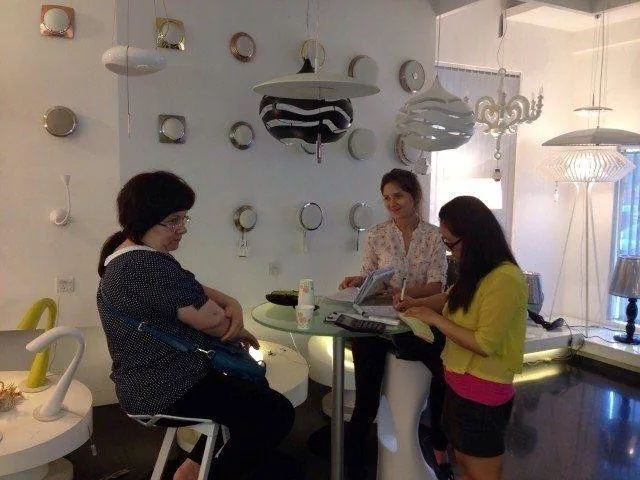 Product discussion in a lighting showroom